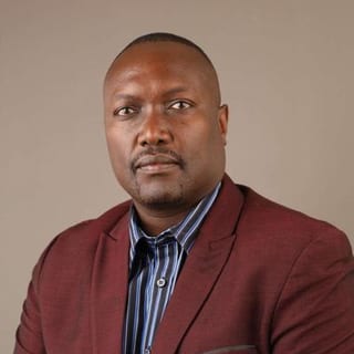Robert Mbui